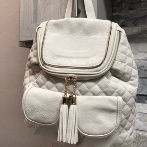 Faux suede quilted backpack purse